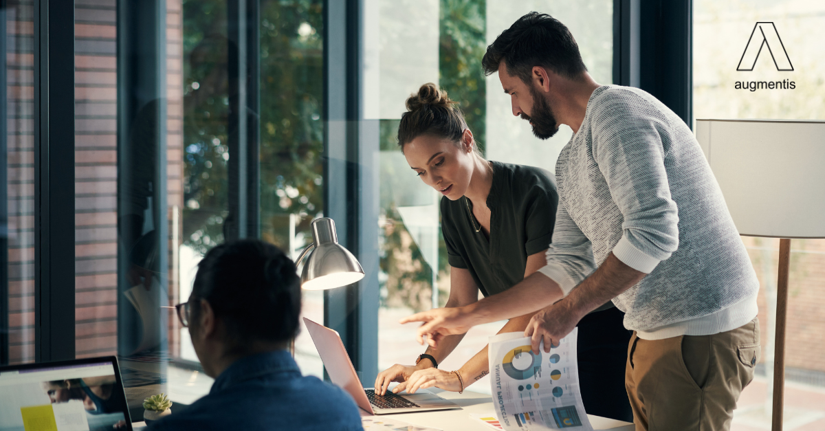 Senior marketing leaders reviewing B2B content strategy to reduce B2B content overload